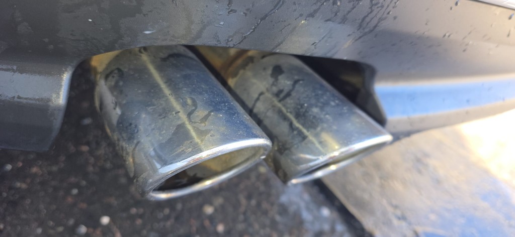 Dull, tarnished exhaust tips before polishing